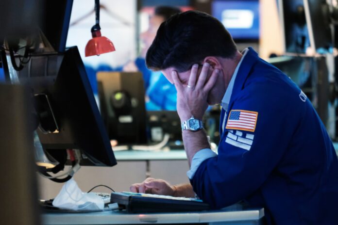 Stock futures are flat in overnight trading after a losing day