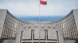 China's central bank governor said there was scope to further cut banks' reserve requirements and vowed to use monetary policy to support consumer prices.