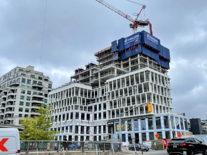 Cladding, Glazing Appear on Growing James at Scrivener Square