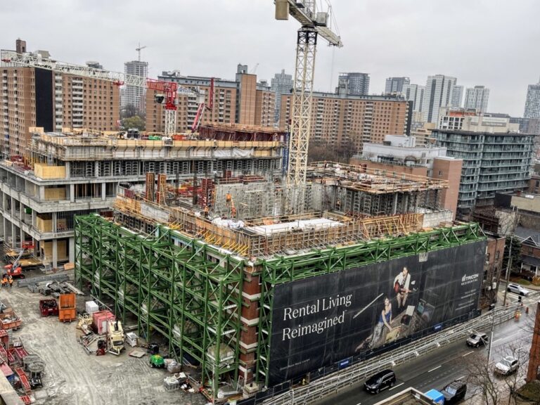 ROQ City Towers Beginning to Rise Above Heritage Walls in Moss Park