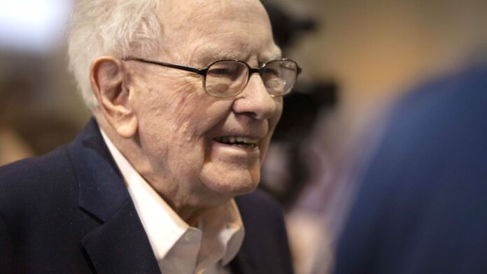 Warren Buffett amasses more cash and sells more stock, but doesn't explain why in annual letter