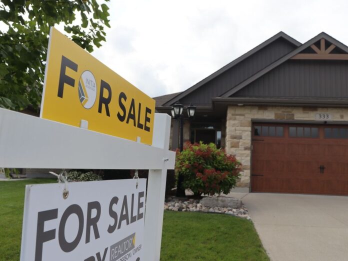 One shown for the sales sign in front of a house in Sarnia.