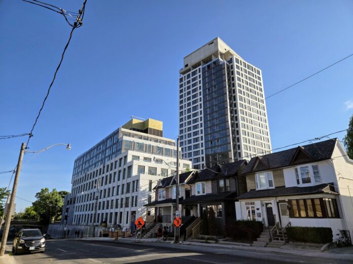 The Spoke Topped-Off in Carlton Village, Cladding Nearly Complete
