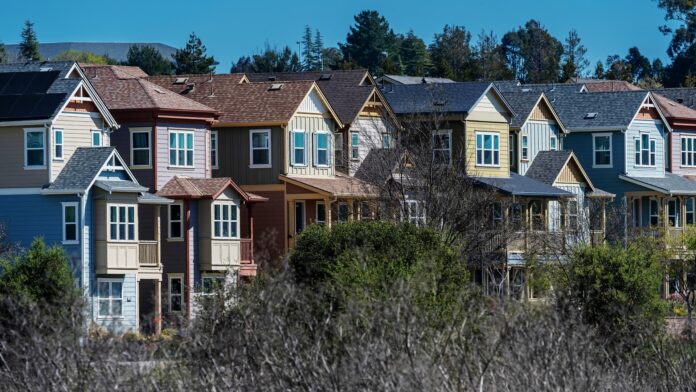 June home sales drop as prices hit a record high