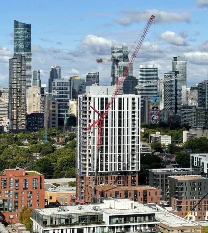 Crane Dismantles Crane at Daniels on Parliament in Regent Park