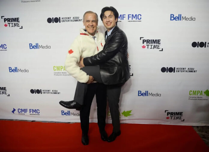 Prime Minister Mark Carney poses for a photo on the red carpet with TV series star Hudson Williams 