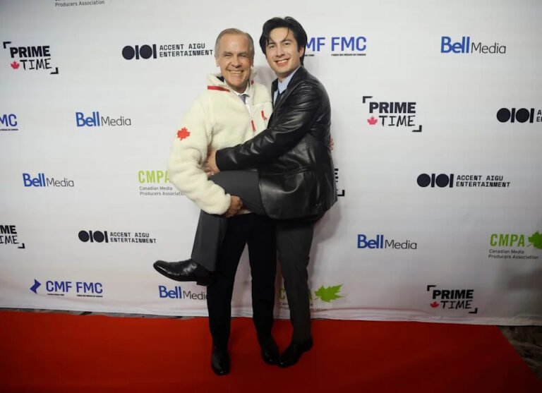 Prime Minister Mark Carney poses for a photo on the red carpet with TV series star Hudson Williams 