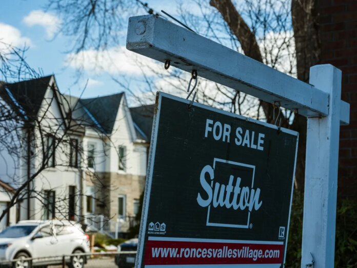 A house sign reading 