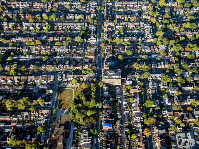 Houses are visible in this aerial photo over Toronto, Ontario.